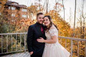 The Landmark Resort | Egg Harbor | A newly wed couple standing on the terrace. Photo Credit: Tandem Photography