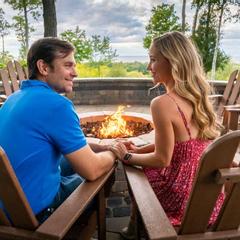 The Landmark Resort | Egg Harbor | Watch the sun set on the horizon by the warm fire's glow