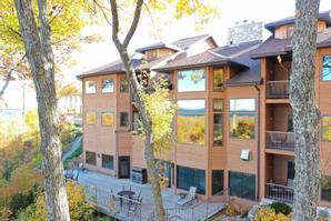 The Landmark Resort | Egg Harbor | An aerial shot of the Landmark Resort surrounded by beautiful fall colors