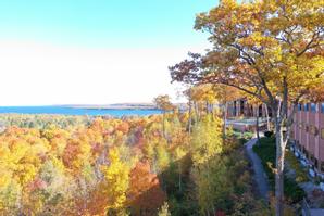 The Landmark Resort | Egg Harbor | An aerial shot of the Landmark Resort surrounded by beautiful fall colors