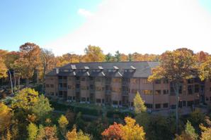 The Landmark Resort | Egg Harbor | An aerial shot of the Landmark Resort surrounded by beautiful fall colors