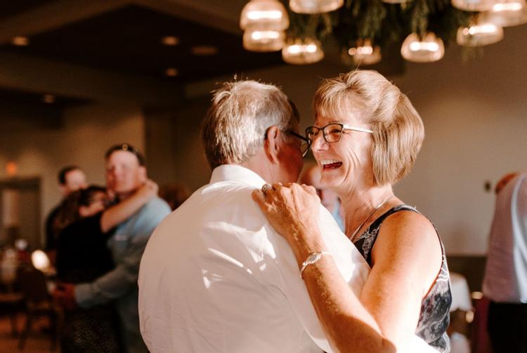A couple dancing at a wedding reception in the Egg Harbor Room. Photo Credit: Lish Marie Photography