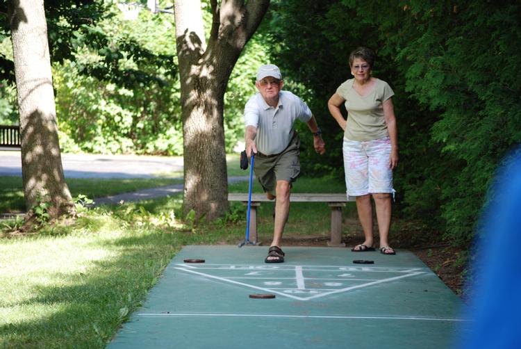 Enjoy a game of shuffleboard outside