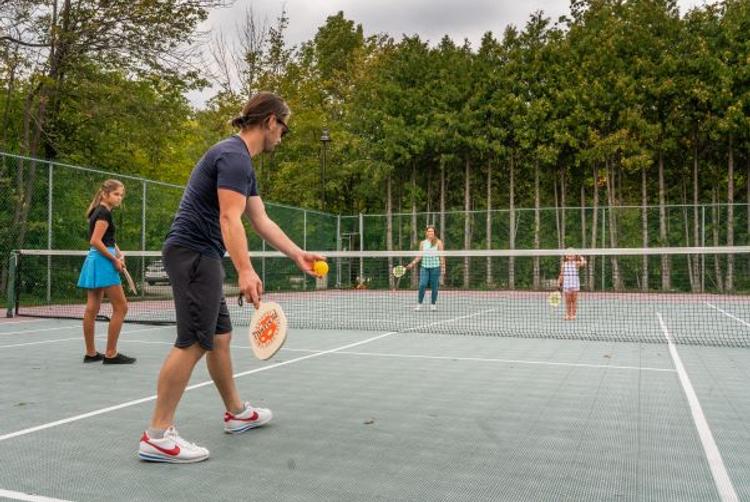 Play a game of pickleball with your friends and family!